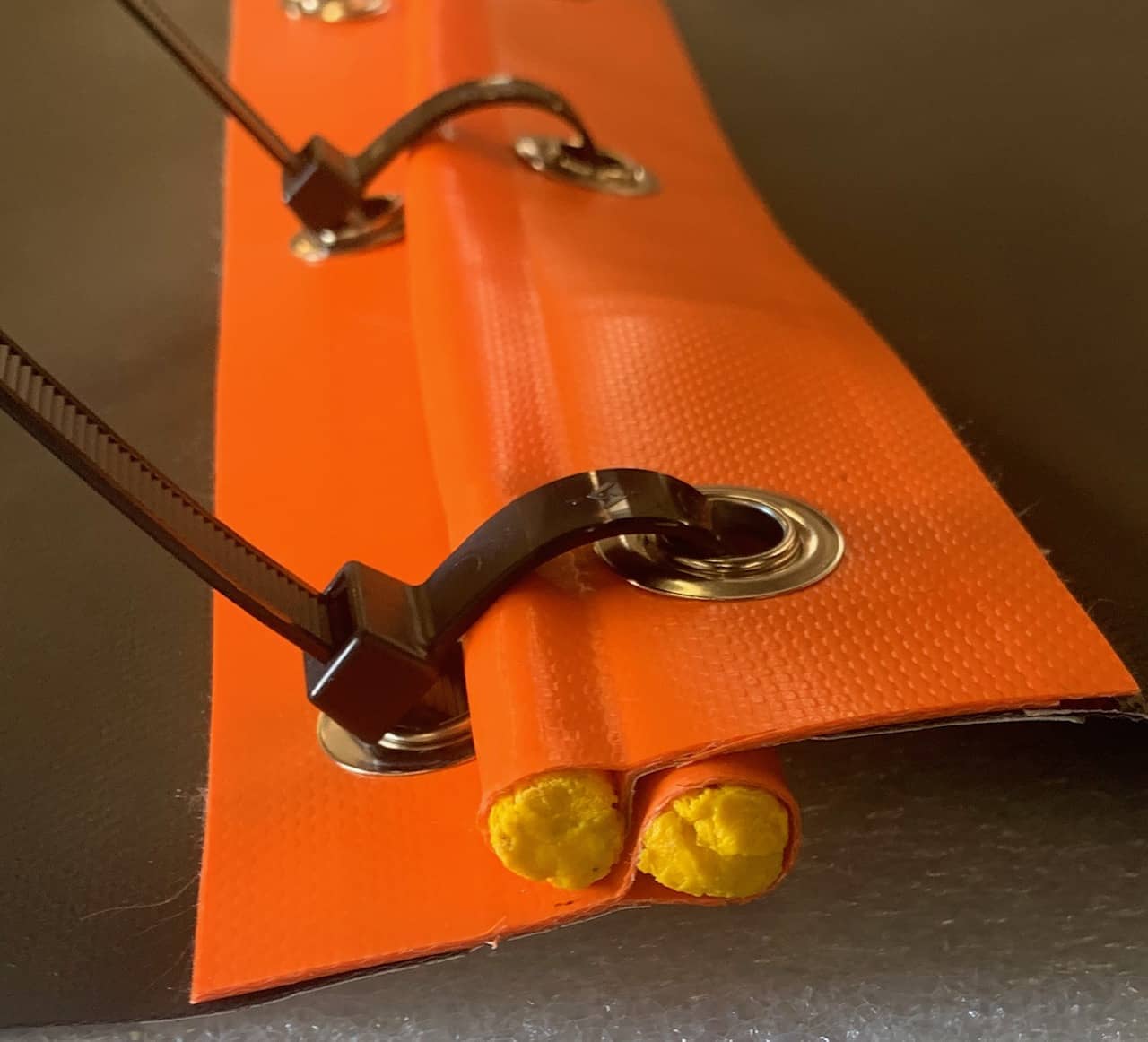 Turbidity Curtain Connecting Grommets with Wire Ties