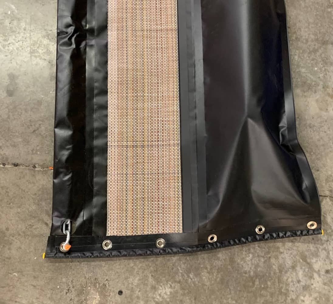 Containment Boom with Permeable Skirt